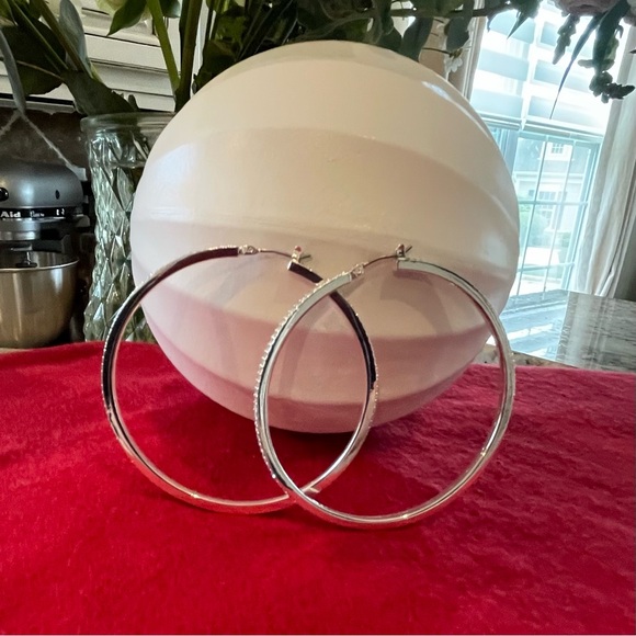 Large silver tone and crystal hoop earrings - Picture 1 of 3